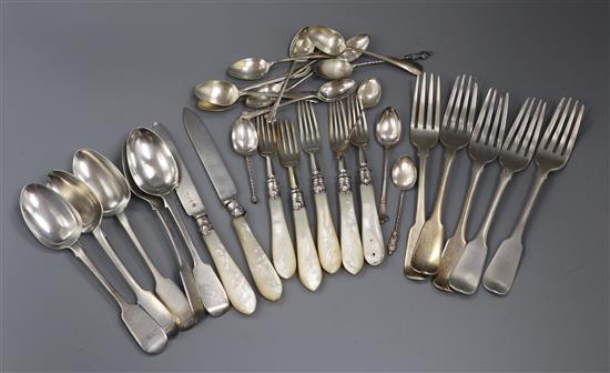 A small quantity of 19th century and later silver flatware including table forks, dessert eaters and small spoons.